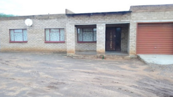 Magogoe Tlhabologo outside