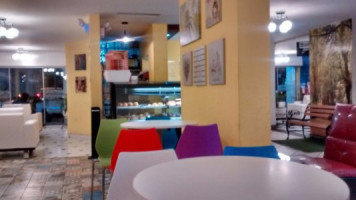 Caprichitos Cafe y Mas inside