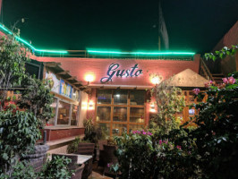 Gusto Cafe And outside