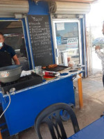 Tacos De Pescado Y Camaron Mariel outside