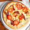 Applewood Smoked Bacon, Artichoke Roma Tomato Pizza