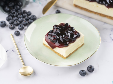 Rebanada De Pastel De Queso Con Arándanos Franceses