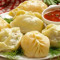 Chicken Momo With Soup And Chutney
