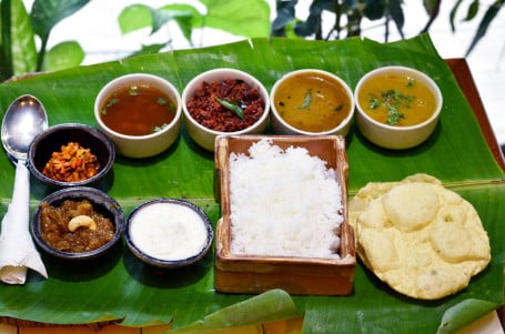 Rice, Sambar, Rasam, 1 Dry Sabji, 1 Gravy Sabji, Curd, Pickle, Payasam, Papadam Combo