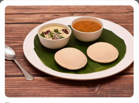 Idly Sambar (2 Pcs) (Served With Coconut Chutney Sambar)