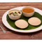 Idly Sambar (2 Pcs) (served With Coconut Chutney Sambar)