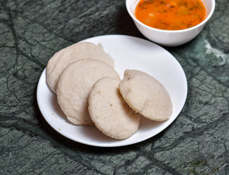 Idli (2 Pcs (Served With Sambar And Chutney.