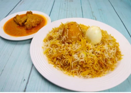 Meni Egg Briyani(500Ml) With Chicken Kasha(1Pcs)