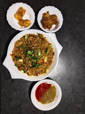 Vegetable Fried Rice With Veg Manchurian(3Pcs) And 2 Pcs Paneer Pakora