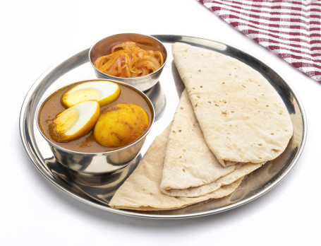 Egg Curry With Rotis Or Rice
