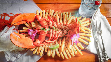 Fire Roasted Lobster On A Bed Of Fries