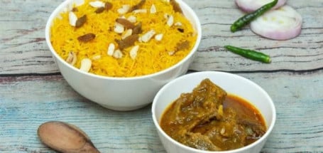Basanti Pulao With Chicken Curry