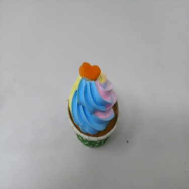Vanilla Cupcake With Rainbow Icing