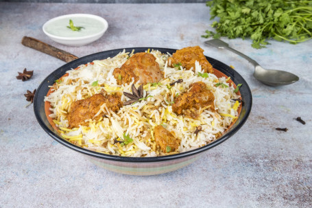 Lucknowi Chicken Dum Biryani (sin hueso) (1 porciones)