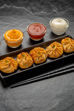 Veg Fried Schezwan Paneer Momos With Momo Chutney