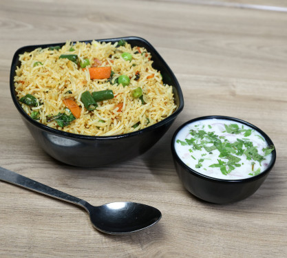 Veg Tawa Pulao (Complimentary Raitha)