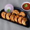 Veg Momos (9 Pcs)