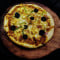 7 Makhni Paneer Pizza 1 Coke (250Ml)