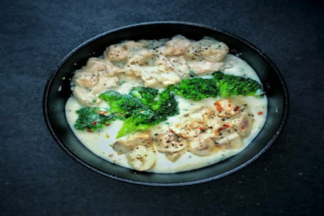 Creamy Chicken With Mushrooms And Broccoli In Italian Herbs