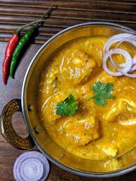 Khoya Paneer Sweet Yellow Gravy]