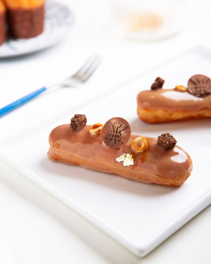 Orange Blossom, Caramelized White Chocolate And Hazelnut Eclairs