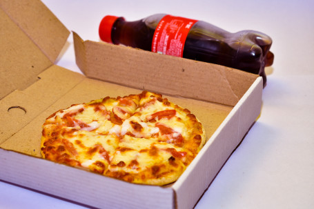 7 Pizza Cold Drink (As Per Availablity)