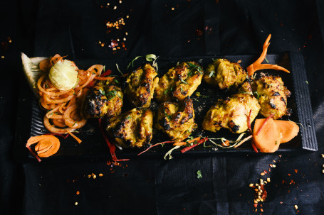 Murgh Lehsuni Tikka(8 Piece)