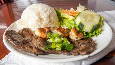 R13. Grilled Beef And Shrimp Cake Over Rice Plate