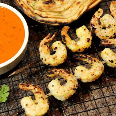 Garlic Buttered Prawn (14 Pcs Served With 200 Ml Dal Makhni 2 Nos Of Rumali Roti