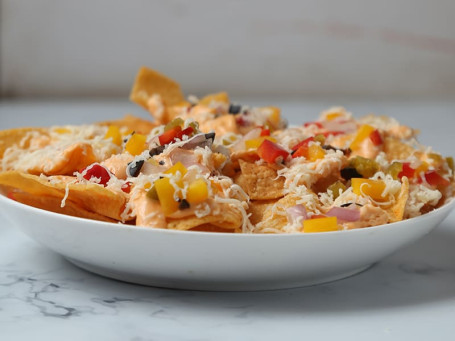 Nachos With Salsa Sauce Cheese Sauce In Mexican Style