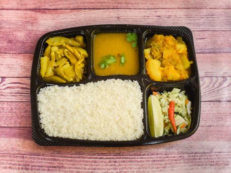 Veg Thali(A Delicious Meal Combo With Items Like Seasonal Sabji, Dal, Rice, Green Salads And Chutneys.