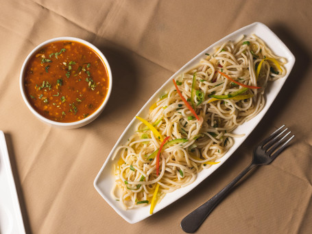 Hakka Noodles With Schezwan Gravy and Cabbage Salad