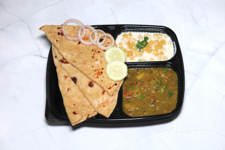 3 Roti, Veg. Sabzi, Raita/Curd, Salad