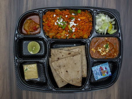 Mini Punjabi Thali (1 Spl .Paneer Sabji 3 Butter Roti 1 Spl.veg Biryani 1 Sweet Achar Salad Mukhwas.