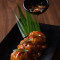 Chicken Steamed Dimsum With Black Pepper Sauce