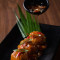 Chicken Steamed Dimsum With Manchurian Sauce