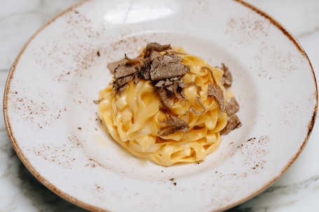 Homemade Tagliatelle With Black Summer Truffle