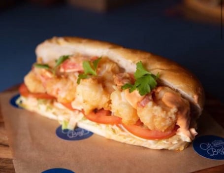 Shrimp Po Boy Sandwich With A Soft Drink