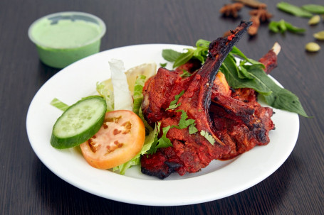 Lamb Cutlets And Salad Pieces