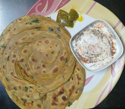 Masala Lachha Paratha (2 Pcs. Mix Veg Raita Pickle