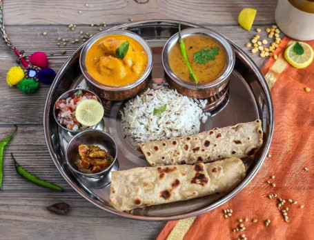 Veg Thali (Cheese Dish Dal Raita Rice 4 Chapatis)