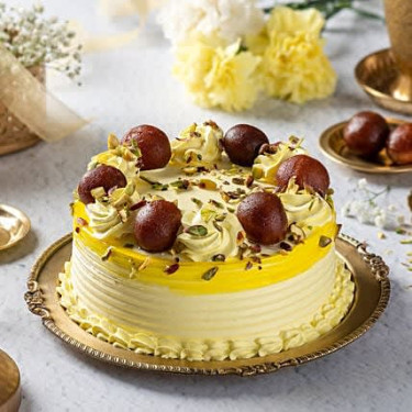 Pista Vanilla Gulab Jamun Cake