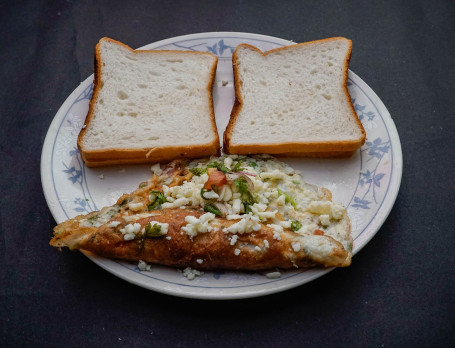 Cheesy Scrambled Eggs With Multigrain Bread