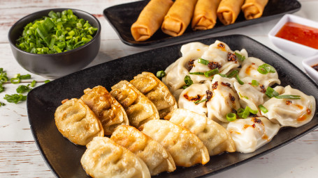 Your Choice Of Our Signature Handmade Steamed Pan Fried Dumplings