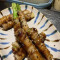 jiàng kǎo tún ròu lú sǔn Grilled Pork and Asparagus with Sauce