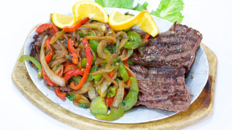 48. Entraña Salteada/ Grilled Skirt Steak Topped With Sauteed Onions And Green Peppers