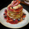 Pancake Stack with Berry Compote and Whipped Cream