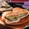 Bǎn Kǎo Jī Tuǐ Qián Tǐng Bǎo Grilled Chicken Drumstick Sub-Sandwich