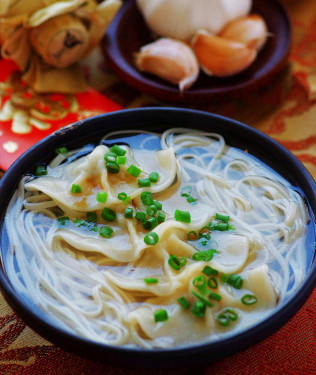 Dumpling And Noodle Soup