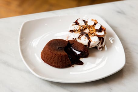 Dolce Tuscia Dark Chocolate Souffle Served With Ice Cream